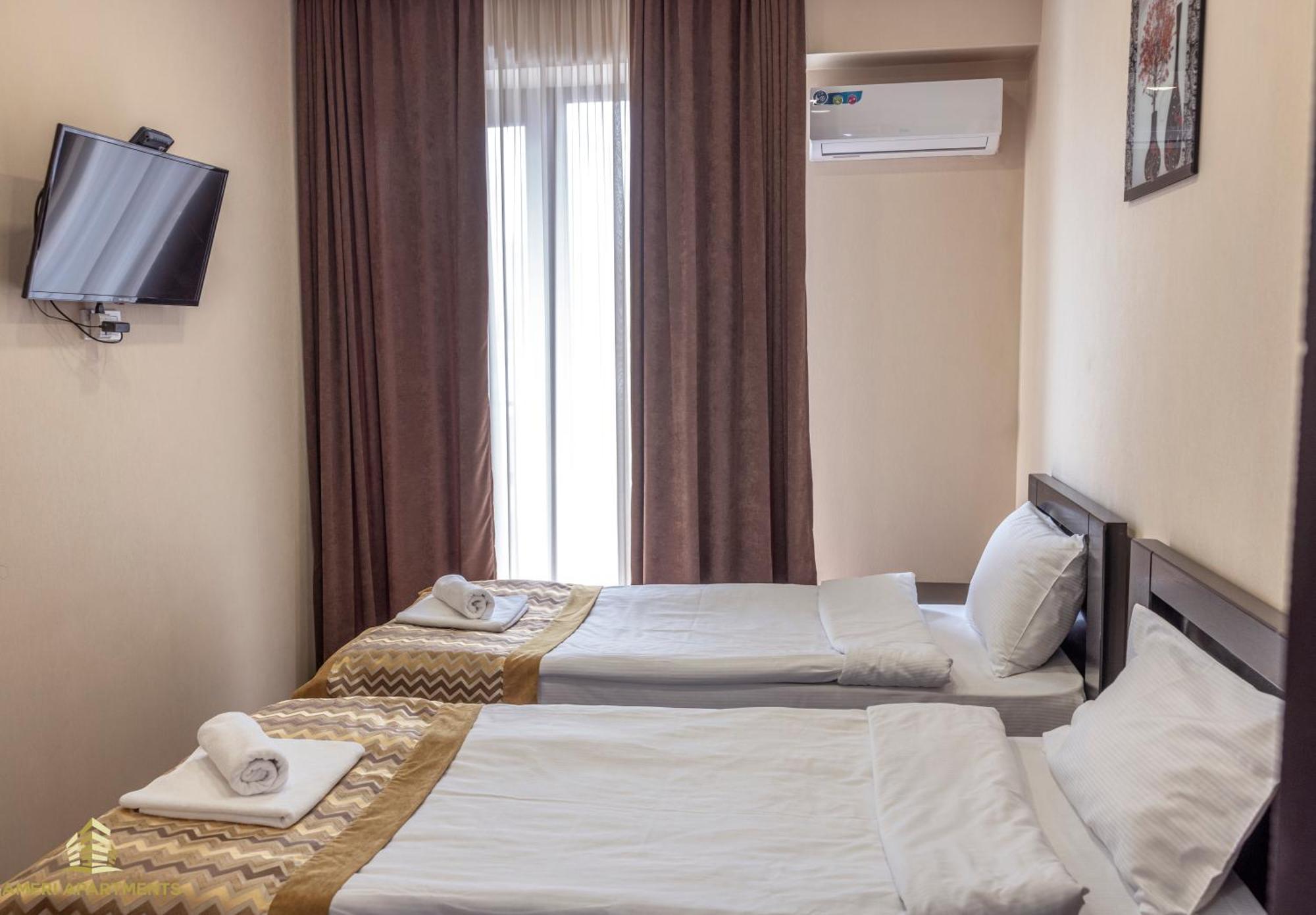 Ameri Apartments Тбилиси Номер фото